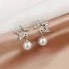 Pendientes de tuerca Lovelink, colgante de estrella Irregular de Color plateado brillante para mujer, bonito accesorio de fiesta con borla de perlas blancas