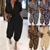 Kvinnors jumpsuits rompers kvinnor kort ärm harem byxor jumpsuit sexig knapp front leopard lös rompers 230317