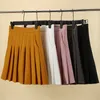 Jupes Jupe plissée avec poches femmes automne jaune Preppy Style élastique taille haute a-ligne minceur noir Kawaii Mini jupe courte 230317