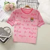 Camicette da donna Top lavorato a maglia primavera / estate da donna Lettere femminili ricamate con cartoni animati Pullover rosa T-shirt carina Kawaii Top NS576