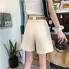 Camisetas de mujeres al estilo coreano de mujeres pantalones de cinco puntos de cinco puntos Shorts sueltos con cintura alta