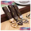 Keychains Lanyards Pu Leather Keychain Designer Key Chain Buckle Lovers Car Handmade Men Women Bag Pendant Accessories Drop Delive Dhirq
