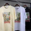 Camisetas para hombres Rhude Diseñador Rhude Angel with Gods Ayuda camisas de gran tamaño Camisa de moda de la marca de lujo para hombres Manga corta Manga corta Cotton T3102