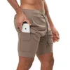 Hommes 2 en 1 Shorts de course Jogging Gym Fiess entraînement séchage rapide plage pantalons courts mâle été sport entraînement bas Bermuda W0320