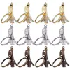 Anéis -chave 50pcs Paris Eiffel Tower Shapy Keychain Novelty Gadget Tinket Sovevenir Christmas Gift 230320