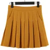 Jupes Jupe plissée avec poches femmes automne jaune Preppy Style élastique taille haute a-ligne minceur noir Kawaii Mini jupe courte 230317