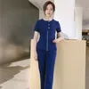 Pantaloni da donna in due pezzi Set da scrub da donna personalizzato all'ingrosso Top con cerniera in metallo e pantaloni Uniforme da infermiera 230320