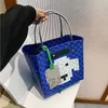 sacs de plage femmes sacs de designer seau tissé sacs à main de luxe Couleur correspondant panier en plastique tissé sac à provisions 230301