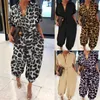 Kvinnors jumpsuits rompers kvinnor kort ärm harem byxor jumpsuit sexig knapp front leopard lös rompers 230317