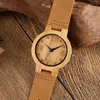 Montres-bracelets Creative Montre en bois naturel pour homme Numéro romain Craving Dial Quartz Woody Cadeau Bracelet en cuir véritable Montre-bracelet Reloj Hombre