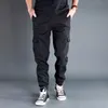 Męskie spodnie Męskie spodnie Casual Black Joggers Spring Lato Multi Pocket Worbgy Sport Sports Fashion Męskie spodnie dresowe duże kombinezony Bottoms 230320