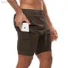 Hommes 2 en 1 Shorts de course Jogging Gym Fiess entraînement séchage rapide plage pantalons courts mâle été sport entraînement bas Bermuda W0320