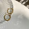 Hoop oorbellen Huggie Gold kleur roestvrij staal voor vrouwen kleine eenvoudige ronde cirkel geknoopte zoete elegante accessoireshoop