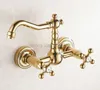 Grifos de lavabo de baño montado en la pared de latón de Color dorado pulido grifo de caño giratorio de cocina/lavabo grifos mezcladores de manijas cruzadas dobles Wgf019