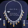 Bruiloft sieraden sets driegraces luxe groene cz stenen oorbellen ketting set briljant grote lange druppel bruiloft bruidsjurk sieraden set voor vrouwen js256 230320