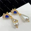 Chic Designer Pearl Pendant Studs Donna Data Orecchini di diamanti Orecchini a cerchio di fiori Gioielli Festa di nozze Regalo di compleanno