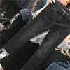 Jeans da uomo all'ingrosso 2023 moda donna di grandi dimensioni vestiti autunnali buco strappato grasso coreano elasticizzato sottile pantaloni alla caviglia sottili
