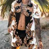 Tute da uomo Summer Daily Beach Shirt Set Tute in due pezzi S-3XL Fashion Hawaiian Print Manica corta da uomo Pantaloncini da cocco T230321
