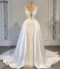 Glamorös spetspärlade sjöjungfru bröllopsklänningar med avtagbart tåg Modig Satin V Neck ärmlösa Vestidos de Novia Arabic Aso Ebi Plus Size Bridal Gowns CL2045