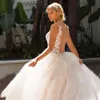 Abiti da sposa in abito da ballo da ballo in pizzo con maniche lunghe di tulle da favola da sposa da pila