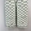 여자 스웨터 디자이너 23SS FW Women knits with with Letter 버튼 밀라노 런웨이 브랜드 크롭 셔츠 고급 격자 무늬 인쇄 탄성 카디건 재킷 아웃복 ZBWS