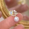 Charm French Luxury Exquisite Opal örhängen Kvinnlig Little Mermaid Ji Pearl Earrings High Quality Shining Zircon Party Earrings Gift G230320