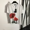 Brevblommatryck toppar t skjortor tees för kvinnor och män sommar mode kort ärm t -shirt par pullover streetwear