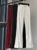 Pantaloni da donna Capris I pantaloni bianchi lucenti alla moda da donna mostrano pantaloni svasati con paillettes a vita alta 230321