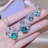 Orecchini a perno di diamanti in pietra verde bling per le donne designer bowknot cz