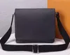 5A Mężczyzn Mężczyzn Nowa przybycie słynna marka Klasyczna projektant mody Mężczyźni Messenger Bags Cross Body Bag School Bookbag Black Flower