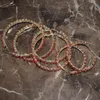 Orecchini a cerchio Huggie strass in vetro colore rosso per gioielli da donna Accessori moda alla moda Accessori Odet22