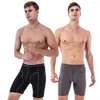 Underbyxor mäns underkläder långa ben boxershorts kompression fitness homme flexibla manliga bodysuitstammar andningsbara byxor