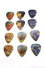 12pcs 071mm Packed Guitar Picks Two Side World Famous Painting Musical Plectrums Great Tin Box7231694