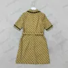 Abiti da donna Tessuto jacquard di lusso Cerniera mezza tagliata Risvolto aperto Maniche corte Abito Cintura Coulisse Vita Design Tasca Trim Slim Maxiskit Abito estivo 1970