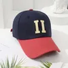 Vår- och sommarfärgsmatchande bokstäver Baseball Cap Kvinnlig Internet Kändis All-Matching Hat Shopping Solbeständig toppmössa Tidvattnet