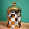 W stylu europejskim ceramiczne butelki do przechowywania słoiki w zwisie bawełniane wymaz z przechowywania słoika do domu ozdoby domowe ceramiczne złoto świecy słoik