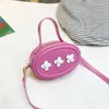 Barns handväska 2023 vår och sommar ny blomma kontrastfärg en axel handväskor koreansk version söt kvinnlig väska fritidsväska