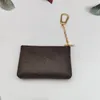 Kreditkortshållare Keychains Rings Leather Brown Flower Coin Pures Pouch Wallet Key Chains Jewelry Fashion Designer Women Bag Pendants Charm Keyrings Accessories