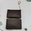 Kreditkortshållare nyckelringar ringer läderbrunt blommomynt Pols Pouch Wallet Key Chains smycken Fashion Digner Women Bag Pendants Charm Keyrings