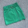 Faldas Primavera Mini falda de cuero Verde / Rojo Doble cinturón Cremalleras divididas Motocicleta High Street Short Jupe Corea del Sur A-line Sex 230322