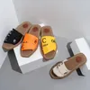 Designersandaler för dam Tofflor Sommarstrand Berömda kvinnor Sandalrandiga Causal Flip Flops Flat Slide Cotton Slid Ribbon sandaler