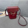 Çantalar erken bahar yeni çok yönlü kova küçük çanta moda çok yönlü cep telefonu çantası taşınabilir hafif bir omuz crossbody