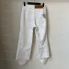 Luksusowe białe damskie spodnie dżinsowe wiosenne letnie dziewięcioczęściowe dżinsy INS dżinsy w stylu ulicznym Vintage rozkloszowane spodnie
