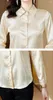 البلوزات النسائية أسيتات الساتان جاكار بلوزة أنثى 2023 الربيع والخريف تصميم متخصصة الموضة مزاج طية صدر السترة طويلة الأكمام كبيرة