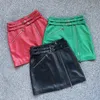 Faldas Primavera Mini falda de cuero Verde / Rojo Doble cinturón Cremalleras divididas Motocicleta High Street Short Jupe Corea del Sur A-line Sex 230322