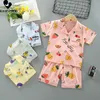 Pyjamas enfants garçons filles dessin animé à manches courtes revers chemise hauts avec short bébé printemps été dormir vêtements ensembles 230322