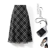 Skirts Knitted skirt in autumn and winter plus size long fat sister slightly slim tassel plaid Aline Q7123 230322