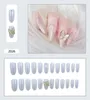 Faux ongles 24 pièces faux ongles Patch blanc vache papillon imprimé complet fini pour fille femmes Art conseils appuyez sur portable