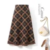 Skirts Knitted skirt in autumn and winter plus size long fat sister slightly slim tassel plaid Aline Q7123 230322