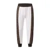 Tute da uomo Designer Tute da uomo versione alta pantaloni con cappuccio firmati due pezzi ricamo jacquard maglione con cappuccio pantaloni della tuta set uomo donna tuta sportiva 7JSA